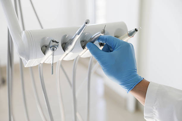 Professional Teeth Cleaning And Checkup technician working in Glens Falls North, NY